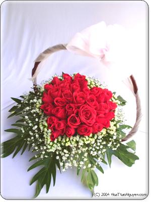 FlowersToSaigon.com: Red Rose Heart Basket  - Show her your true feelings with this elegant arrangement.  This includes 30 red roses, baby breath and greens.