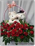 a pair of small PIG(20cm height) with 20 roses.Show her your true feelings with this elegant arrangement
