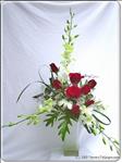 Show someone special how much brighter they make your day with this artfully arrangement. 