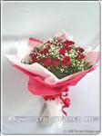 This gorgeous red rose with baby""s breath bouquet is perfectly for an Anniversary or any special occasion