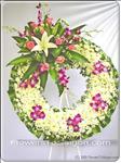 This lovely arrangement will convey your message of caring.  Arrangement includes pink roses, orchids, daisies and lilies. Arrangement is delivered with an easel for display. Approximately 60cm diameter.
The delivered stand is 1.5m high
