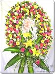 A colorful array of flowers can help someone through the darkest day. Arrives on an easel for display. Approximately 80cmH x 70cmW.
The delivered stand is 1.6m high
