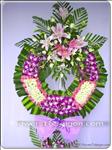 One arrangement is decorated with purple orchids, pink lilies and white asters and pink roses, and arrived on an easel. This wreath, warmly decorated in memory of a loved one lost will bring comfort to family and friends.
The delivered stand is 1.5m high
