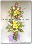 At times of sorrow, a gift of flowers can mean so much. Let them know they""""re in your thoughts. Arrangement is delivered with an easel for display. The wealth is approximately 70cmH x 60cmW and included a stand. The  high after finished is 1m8