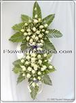This delicate arrangement filled with 66 beautiful white Roses will surely spread some light to those you""re thinking of. This one is delivered on an easel.The delivered stand is 1.8m high